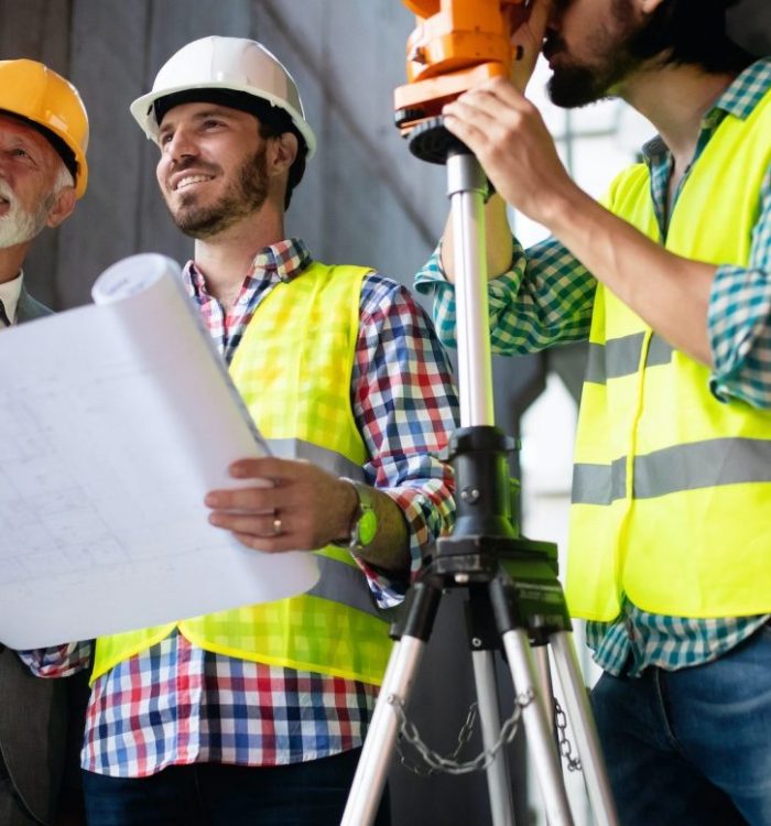 construction-engineer-with-foreman-worker-checking-construction-site-e1669905468418.jpg